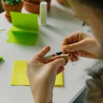 Kid Sewing and Colored Paper